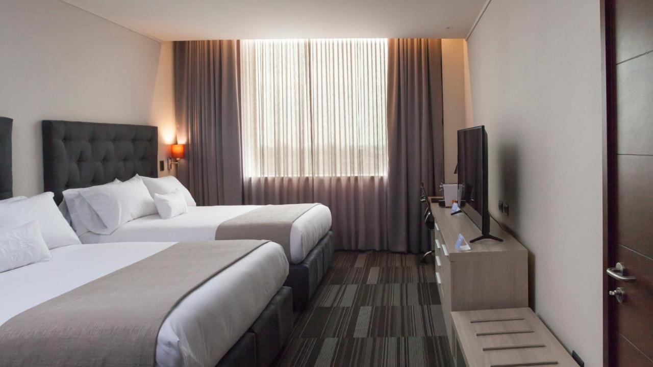 Mds Hotel Chillán Dış mekan fotoğraf A room at the hotel